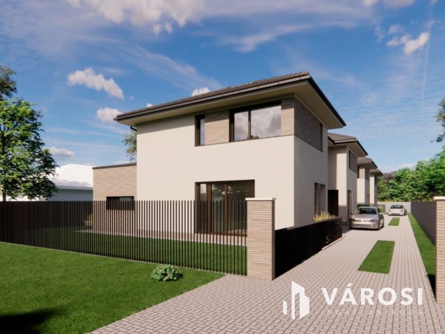 Debrecen csendes kertvárosi részén ELADÓ IKERHÁZ